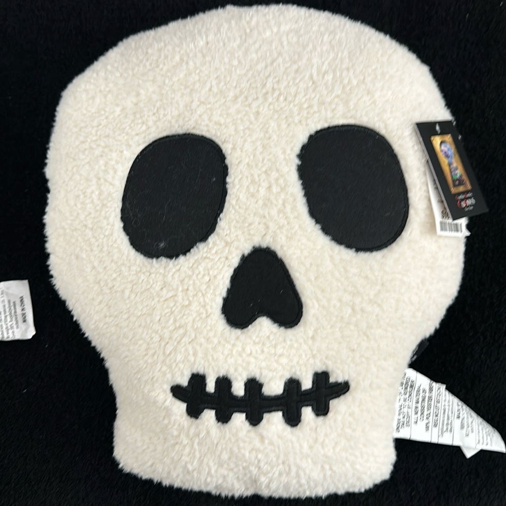 Set of two skull pillows